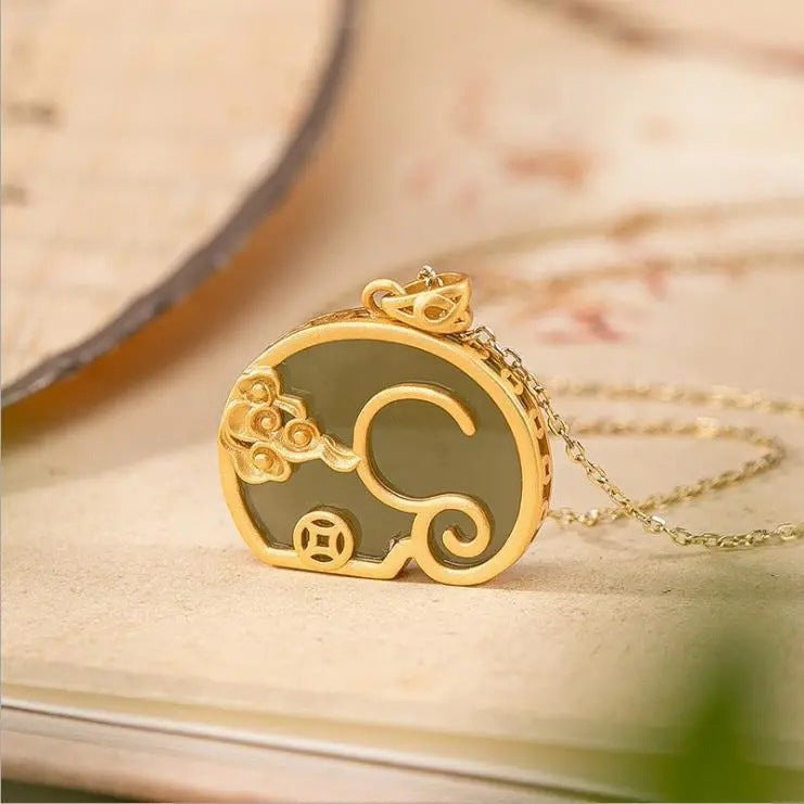 Delicate Artisan Gold Pendant